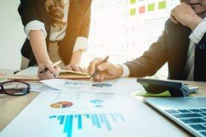 Business people reviewing analytics together