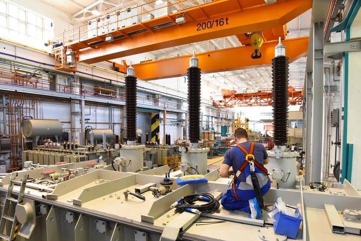 Industrial workshop with worker business process improvement success story