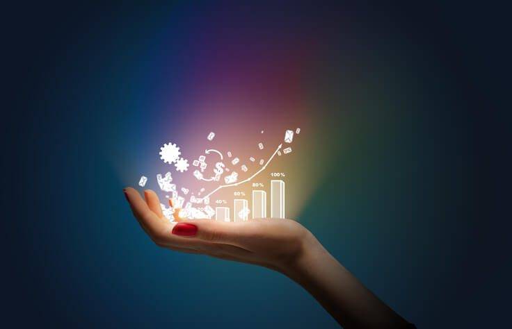 Analytics graphics being held in a feminine hand manufacturing quoting and costing